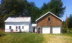 This 3 bedroom quintessential Vermont farmhouse is situated on 25 wooded acres close to Metcalf Pond recreational area. It features raised beds for vegetable gardens, an outdoor wood boiler, a 28x30 attached garage with 200 amp service, wood floors, and