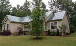 Beautiful home on over 2 lush acres in El Porvenir Airpark near Boykin. Granite, tile, bamboo hardwoods, maple cabinets with trey and cathdral ceilings! Sprinkler system with well water. Whirlpool tub and double sinks and seperate shower in master bath.
