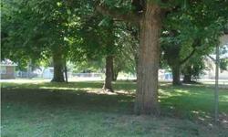 Great building lot at the edge of town. Nice level lot with several big shade trees. There was a mobile home there at one time so all utilities are on the property. A must to see - big corner lot. Low taxes.Listing originally posted at http