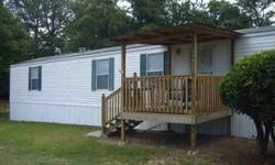 Nicely kept 2 bed, 2 bath mobile home in excellent condition. Affordably priced and energy efficient. Located on a quiet, premium lot. Houston County School district, short commute to RAFB. Amenities include family-size washer & dryer, dishwasher,