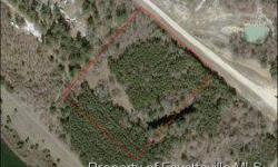 -Great piece of five acre land just ready for the right builder! A portion of a pond is located on this property.
Listing originally posted at http