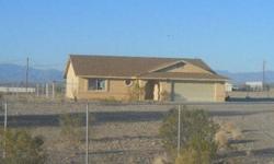 Great home in Havasu Heights on over 2 acres. Brand new Carpet! Room for horses, lots of area to play and tons of room to build. Perfect area if you like your privacy, but want to be close enough to enjoy all of what Lake Havasu City has to offer. Sold As