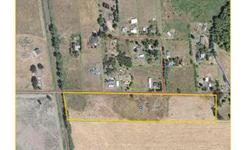 Development land in Millersburg. 11.80 acres of bare land, zoned Rural Residential - Urban Conversion - RR-10-UC by the City of Millersburg. Zoning is applied in rural residential areas with standards for continued rural development until a transition to