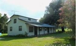 -Short Sale. Three bedroom, two bath home with 3 extra rooms that could be bedrooms, for a total of 6 bedrooms!! Beautiful wood throughout home, sky light in the living room, front and back porches, located on 2.8 acres with a creek bordering the