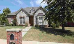 Exceptional 3/2.5, walk to Jenks West Elementary. Split plan with formal dining and office. Both wood and beautiful tile floors. Silestone counters in kitchen. Huge master dressing closet. Waterfall in back yard.Listing originally posted at http