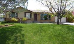 Nicely upgraded brick home in desirable location east of Twin Falls. Enjoy our great Idaho summer evenings with a large covered patio, fully landscaped yard with automatic sprinklers and mature trees and a very fragrant lilac bush. Separate living and