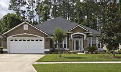 This split floor plan includes a downstairs master bedroom and two additional bedrooms with an upstairs bedroom and bathroom that can be used as a bonus room. Master bathroom has garden tub, separate shower, and walk-in closet. A solar heated, screened in