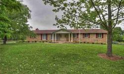 BRING YOUR HORSES - THIS BRICK HOME SITS ON 3.6 ACRES - FEATURES A LARGE MASTER SUITE - 3 SEPARATE LIVING AREAS - 2 FIREPLACES (1 STONE) - 2 STALL BARN & WORKSHOP - SMALL PLANTING GREEN HOUSE - SMALL BEDROOM NEXT TO MASTER MAKES A NICE NURSERY OR