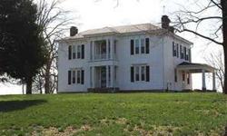 Historic Hammond House on 5 fenced acres, recently restored, poplar floors, 12 ceilings, 5 fireplaces (3 with gas logs and 2 woodburning), 2 staircases, balcony, 4 outbuilding, 3 BR, 2 1/2 BA, cellar, screened in back porch, over 3,500 sq ft, new furnace
