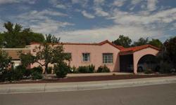 Fantastic Albuquerque Country Club home at a great price. Owner ready to sell AS-IS and with updating it could be awesome. Just a stones throw from the clubhouse. Adorable 2 bedroom home with garage converted with it's own bathroom for 3rd bedroom,