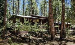 Bordering the Prescott National Forest, this gem of a home is spacious and comfortable with lots of breathing room. Creature comforts include a newer pellet stove in the living room, ceiling fans and even a whole-house-fan to capture those sweet summer