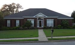 4br 2bth brick home on big corner lot with double car garage, & screened in back porch in Meadowlake Subdivision in Northport.