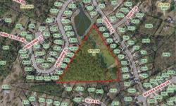 BEAUTIFUL TRACT OF LAND WITH 2 ACRE POND ACCESSIBLE FROM OSPREY LANE IN OAKBROOK SUBDIVISON, ACREAGE ALSO HAS ACCESS FROM KING TAYLOR DRIVE. MATURE HARDWOODS AND PINES, RARE FIND THIS CLOSE IN FOR COLUMBIA COUNTY!Listing originally posted at http