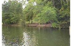 Beautiful wooded waterfront lot. Gentle slope with 96' waterfrontage and 143' on roadside. 4 bedroom perc on file.
Listing originally posted at http