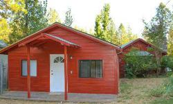 Nevada City Cottage on nearly Â½ Acre. This Trust Sale property is on a quiet cu-de-sac adjacent to 49 and just a few minutes from historic downtown. Quaint mid-century style and a completely usable sunny parcel. One of the bedrooms features a wonderful