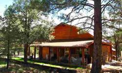 This log home is located in the woods of Timberlake Ranch Subdivision, a few miles from the reservoir. 7+ ac. of varied trees, some open meadows, areas for gardening, a large porch for watching wildlife while enjoying your full time home or vacation spot.