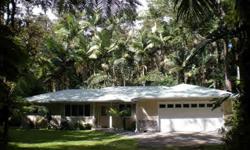 Privacy in the beautiful tropical forest! This lovely home is set down a long private driveway for secluded living, yet with the convenience of being located in Leilani Estates.
Our 4 BR 2 BA home was built in 2005, and has been remodeled, repainted, new