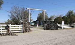 If you are looking for a 3 Bedroom/2 Bath Ranch house with nearly 20 acres of land. Storage building, shop, mare motel, private irrigation well, private domestic well, Built in Barbeque. Beautiful views and lots of potential here it is. Seller will