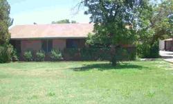 This well cared for brick home on over one irrigated acre with navel orange, juice oranges, whiter grapefruit, pink/red grapefruit, fig tree, pecan, etc and the house has 3 beds two baths with the mother in law detached from the house studio with extra
