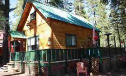 ADORABLE turn key Tahoma Cabin nestled in the trees! This is the one you have been looking for with open space on the side and back of property and just steps from acres of hiking and biking. This charming property features a newly remodeled kitchen and