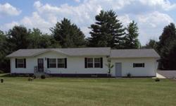 Home has full basement, central air conditioning, gas heat, gas fireplace, laundry room on main floor, attached 2 car garage with gas heater (sheet rock and insulated). There are 2 sheds on the property, 18x24 and 28x48. Located 2 1/2 miles from the town