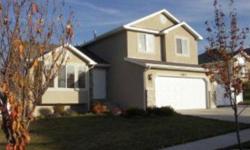 INCREDIBLE HERRIMAN TRI-LEVEL Are you looking for a home with an open floor plan, vaulted ceilings, and plenty of sunshine streaming inside the house? Is a two-car oversized garage with an adjacent RV pad important to you? Then you owe it to yourself to
