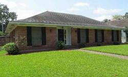 This brick home is so solid. Excellent quality construction built in 1965. The home has three bedrooms, two tile baths, large living room with separate dining room adjoining. Slate floors in the foyer. Double carport off rear alley with storage area. Nice
