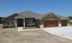 J.Clark Homes Voted #1 Builder 6 Years In A Row. Come out to elegant life outside of the city limits which means lower taxes for you! This beautiful home boasts laminate flooring, chair rail, crown molding in the formal living and dining areas. The