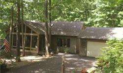 Keuka Lakeview Contemporary home.Located on the tip of the NW finger of the lake, nestled in the woods on 3 acres.Privacy! Quality construction with a 2 story living room with woodstove, kitchen with bkfst bar, formal dining room,1st floor master bdrm.2nd