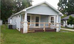 $22,500. Fix Me Up Exterior Appearance - Vinyl, New Windows, Covered front porch, Level Yard, Fenced Back Yard with nice outbuilding. Interior needs new floor covering and sheetrock . Also needs new roof. Good handy man special Concrete Drive and Carport.