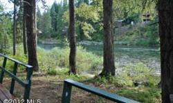 Just Plain Peaceful! Cute and neat as a pin 2BR 1BA cabin with sleeping loft. This cabin is so close to the river that if you fall off the deck you might get wet!Listing originally posted at http