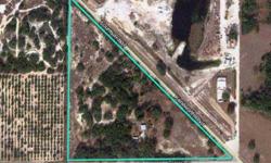 Two Bank owned parcels totaling over 14 acres plotted for future subdivision. Property is listed under two STRAPS