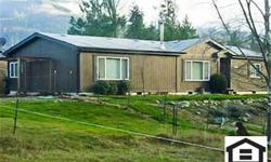 Affordable "Horse Property/Ranchette" priced to sell at "Short Sale" terms!! Pastoral, rolling 5 acres fully fenced for horses, mtn views, end of road privacy! Very nice manufactured (newer/Redman) home on full concrete foundation, cozy airtight stove on