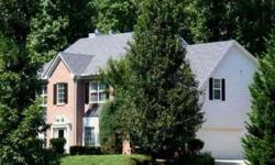 Two Story Brick Traditional located on a large wooded lot in a quiet lake community.Listing originally posted at http