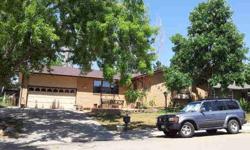 HAS TREMENDOUS POTENTIAL. SPRAWLING RANCH WITH MATURE LANDSCAPING.Listing originally posted at http