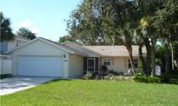 Relax and enjoy life in this 3BR Island charmer built in 1990. From the moment you walk into this meticulously maintained home you will realize that this is all you need. The great room is tiled, has a vaulted ceiling and has hurricane sliding glass doors