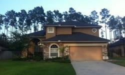 Beautiful 4/3.5 stone front home with zoysia grass, plantation shutters, paver walk way, cathedral ceilings, guest suite, large loft and downstairs master bedroom. A rated schools at St. Johns county with Community pool, work out facilities, and