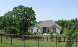 Beautiful home nestled on 5.5 acres m/l. Open living w/wood burning fireplace and blower, kitchen w/eat-in dining w/view of the pond from window area, master bath w/whirlpool tub, office/study area. Landscaped, mature trees, wooded, pond and abundant
