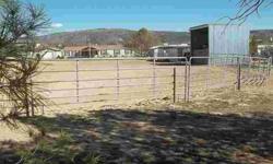 Finally, a horse facility that is all set to go without all the short sale and foreclosure hassles. Come see this Cornville mini-ranch complete with a nicely upgraded home. Property is fenced with large arena, horse shelters, roping setup, hay barn,