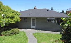 Updated daylight rambler in a terrific neighborhood across from Everett's Golf and Country Club. Brazilian Cherry hardwood and marble tile flooring and new carpet throughout make this a very desireable Fannie Mae home. Partial mountain views from the back