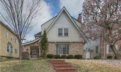 Beautiful Armour Hills home with tons of charm and detail. Lovely molding, doors and doorknobs in addition to some beautiful arches and lighting. This home has so much to offer, from the charming front porch to the private drive with 2 car detached