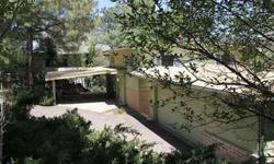 Beautiful 1960's SlumpBlock Rambler in DonnyBrook estates. Just off Park avenue within walking distance of downtown Prescott. Home offers 4 bedrooms, 3 baths, laundry room, livingroom with wood burning fireplace, formal dining room, parlor and potentail