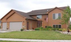 Lake living in Sioux Falls! This 4 bedroom, 3 bath home has everything you need and more! Large lot includes 2 decks, flagstone patio with firepit, Oversize 3 stall garage and plenty of storage. Home is located in SW Sioux Falls, just minutes from