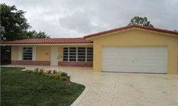 Another Stellar Home! Gorgeous Remodel!! Pool, 2 car Garage Stellar Home!! Sensational home in Coral Springs features plenty of living space. Totally remodeled contemporary kitchen with stainless steel appliances, dark wood cabinets, granite counters and