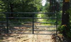 104 acres,12 acre stocked pond with catfish, brim and bass, 80 acres fenced with 16 yr old pines thinned 1 time, 24 acres mixed hardwood, one beds trailor with bath and kitchen, metal storage building, completely fenced.