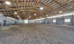 Equestrian facility with 160x80 riding arena and attached barn/tack room (36x36). Lots of possibilities here with commercial potential. Arena has 14 ft walls, 24 lights, 200 amp electrical service and multiple doors. Barn has 18x9 tack room, 9 ft walls, 2