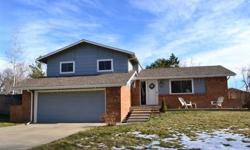 OVERNIGHT NOTICE.Fresh,sunny,spacious home in desireable Longmont Estates-large living & dining rms with vaulted ceilings, eat-in updated Kitchen with tile counters, Master w/private tiled bath, big Family rm w/fireplace, finished rec rm in bsmnt;large