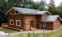 REDUCED PRICE! Welcome to Hanstad Creek Lodge nestled in the trees near the creek offering the ideal country retreat. This quality built log home features all the comforts of modern housing with the peace, quiet & seclusion of the country.An open floor
