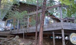 This remodeled ski/vacation cabin is 10 minutes to skiing & 20 to Tahoe. This home has many new updates & upgrades such as; new kitchen, hot water heater, refrigerator, toilet, sink, tub, 60 yr steel roof, travertine around stove, Yodel 8 stove, dual pane