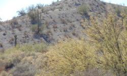Great opportunity in Buckeye, AZ! FOUR 2.5 ACRE PARCELS AT $23,750EACH, A TOTAL OF 10 ACRES! This property backs up to BLM Land and hasBeautiful Views! Good Access, Power close by, lots of potential here!Owner would prefer to sell all parcels together for